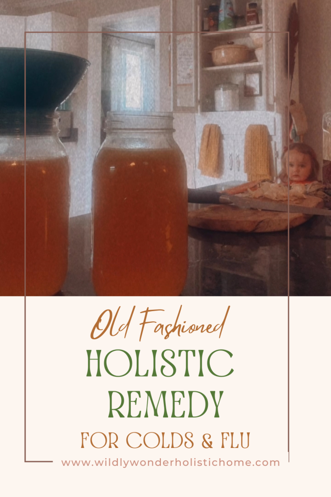 Bottles of onion broth pinterest image with "old fashioned holistic remedy for colds and flu" written on it.